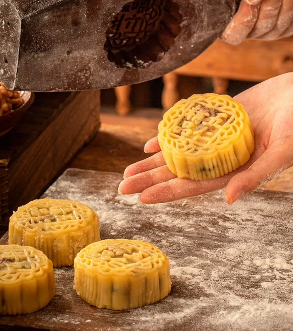 Handmade Mid-Autumn mooncakes with stamped patterns — baked at home for sharing